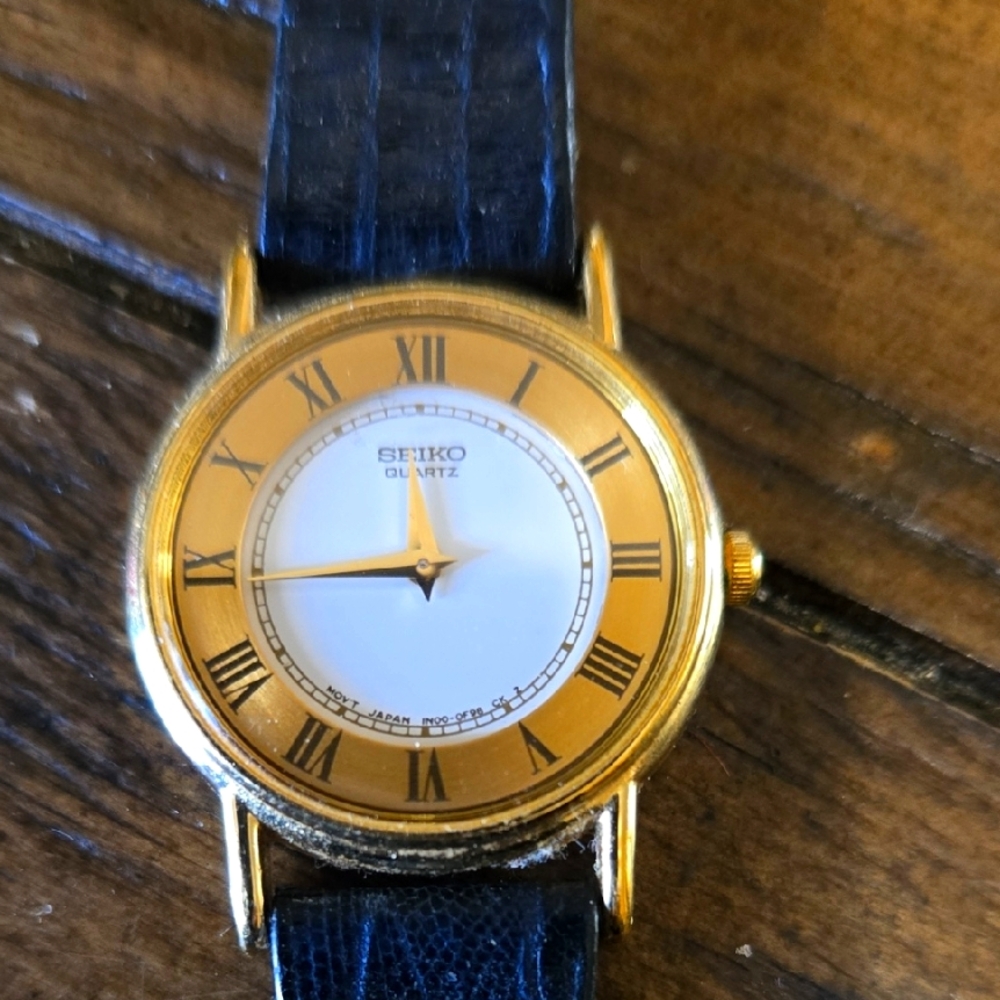 Seiko Gold and Black Roman Numeral Watch